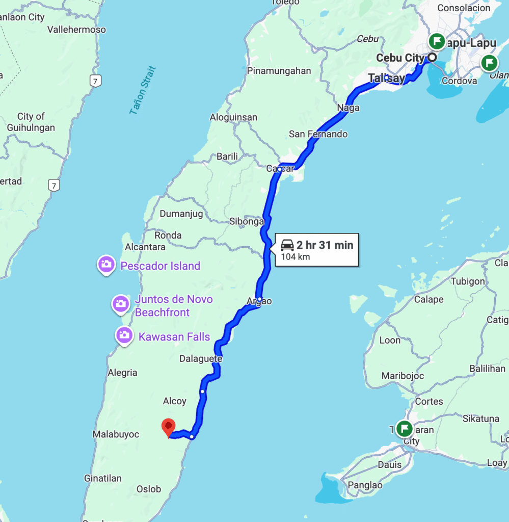 Map showing a driving route from Cebu City to Oslob in Cebu, Philippines, with stops at Pescador Island—a popular Dive Spot Asia site—Juntos de Novo Beachfront, Kawasan Falls, and Brumini Beach Resort. Ideal for international visitors. Estimated time: 2 hr 31 min.